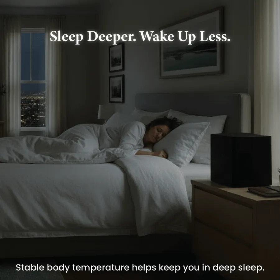 Good Sleep temperature-controlled topper on a bed with a woman sleeping